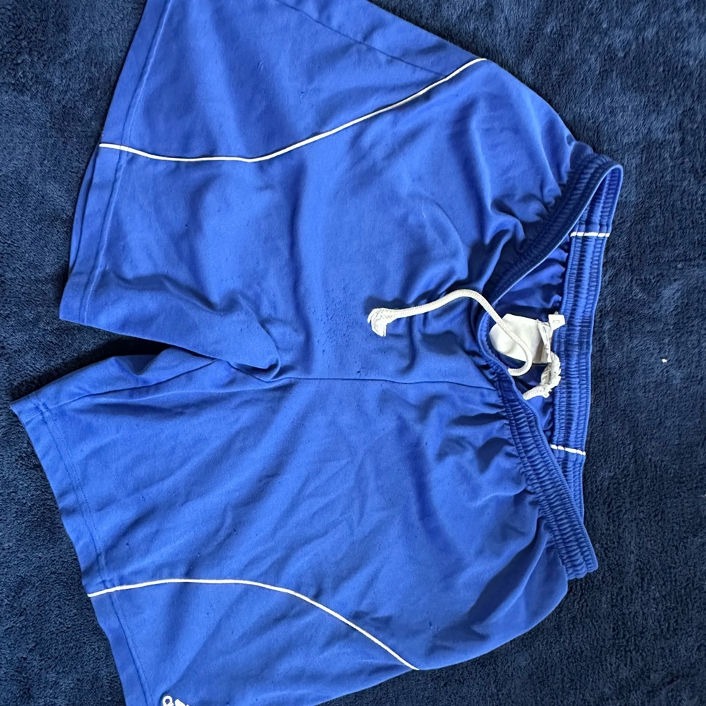 Blue Athletic Shorts with White Trim